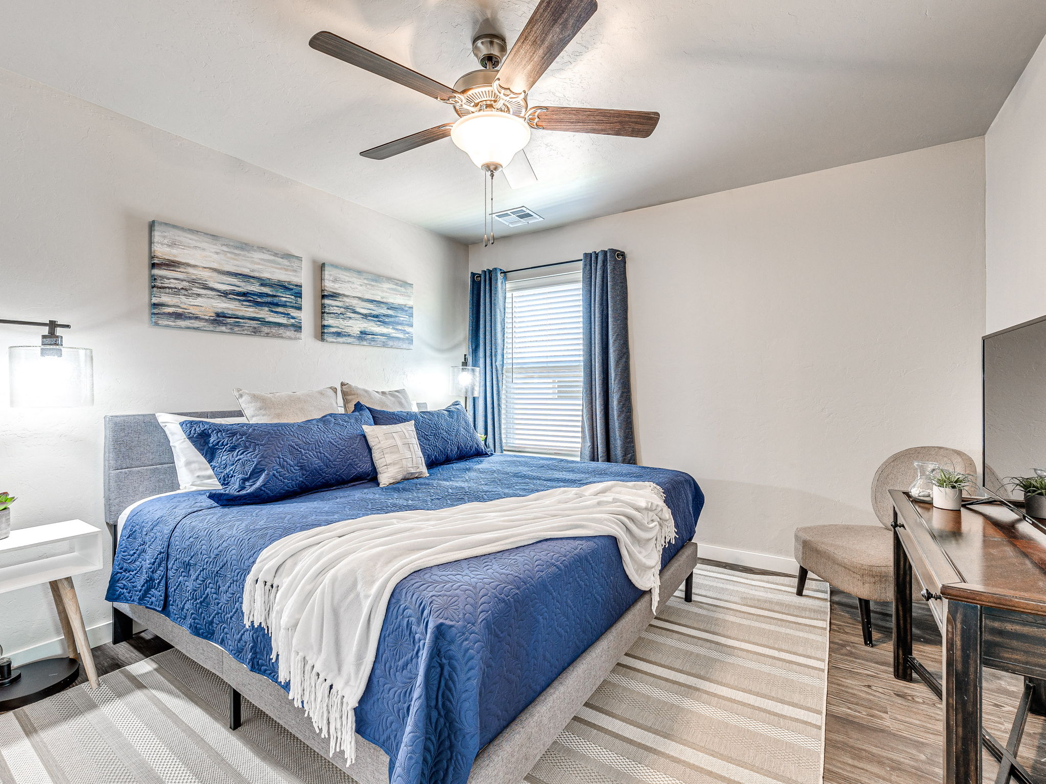 Staged bedroom with blue accents
